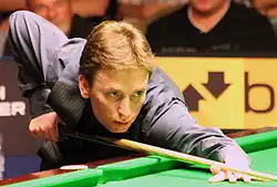 Ken Doherty playing a shot