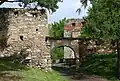 Entryway with first gate, second gate in the background