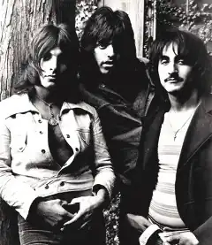 Left to right: Louis Dambra, Gary Justin, John Garner, c. 1971