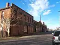Warehouse that no longer exists which stood just west of the Jack Kerouac Lofts