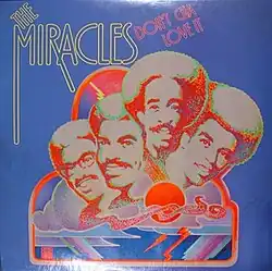 A stylized painting of the band members smiling with their faces as clouds and rays of light and lightning below
